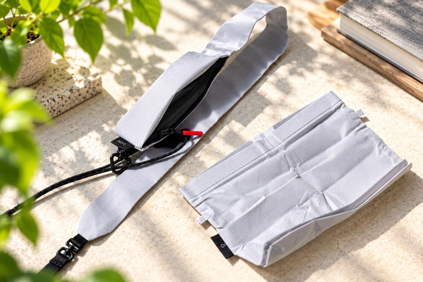 The fun part of this model: a tiny storage pocket built into the strap.