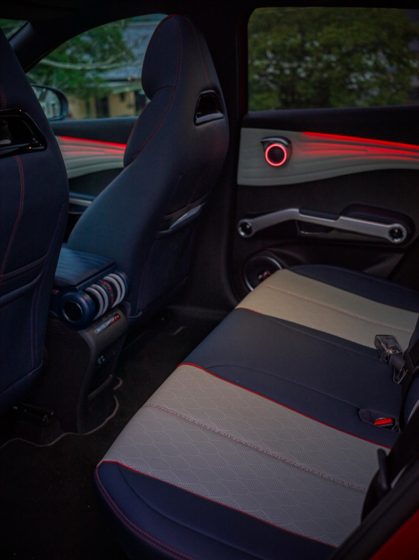 The back seat. Passenger comfort matters too.